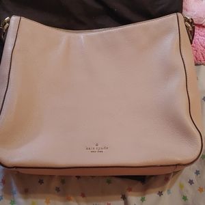 Nude Kate Spade hobo bag comes with a dust bag als